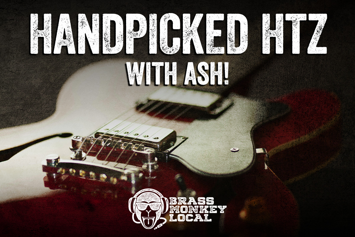 Red guitar with white text and Brass Monkey Local logo